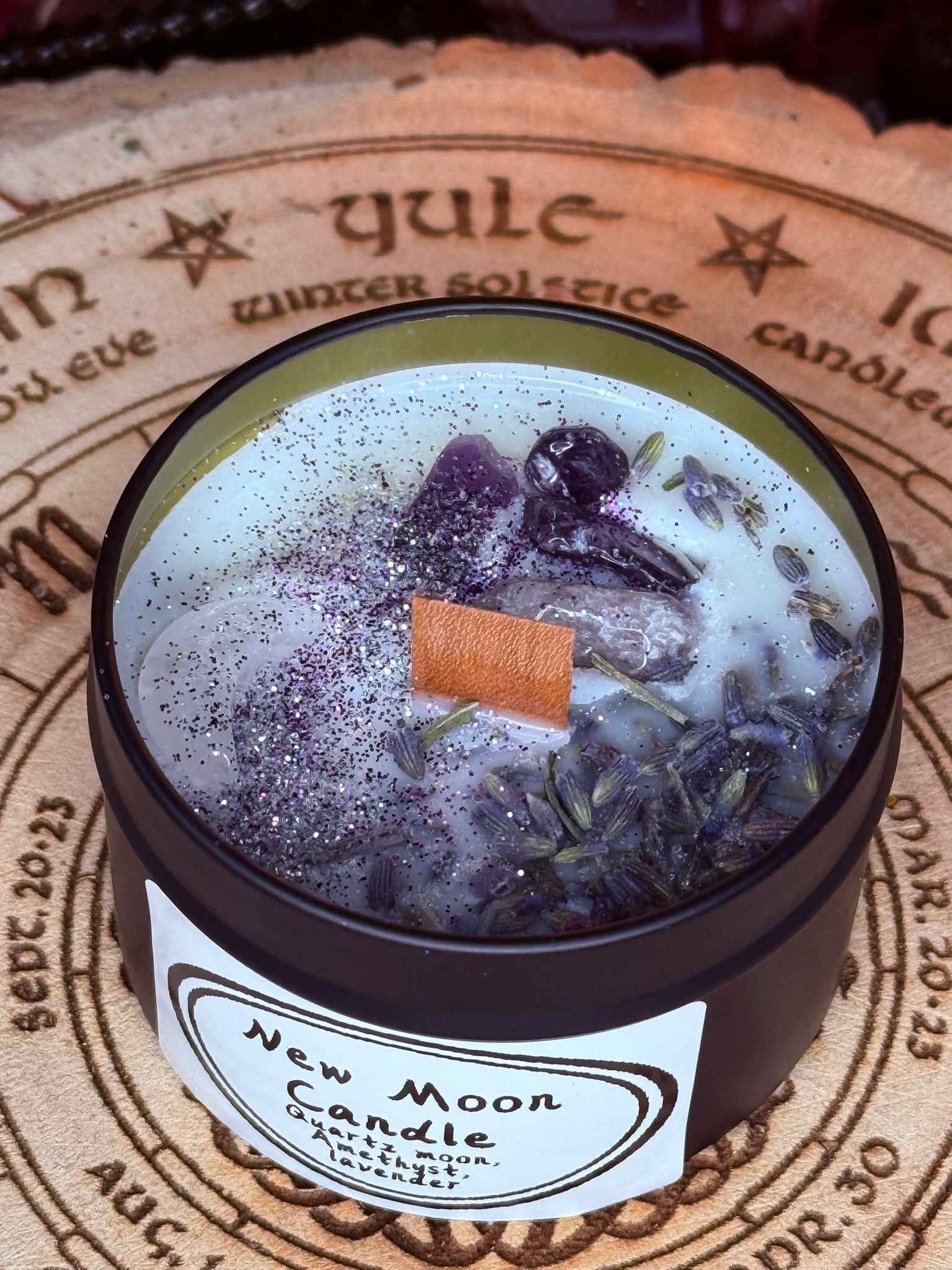 New Moon Candles with genuine crystals.